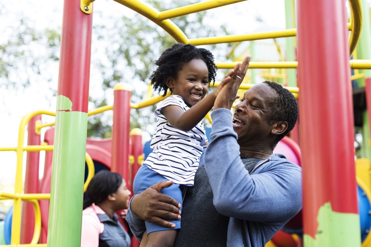 Father and child at a playground