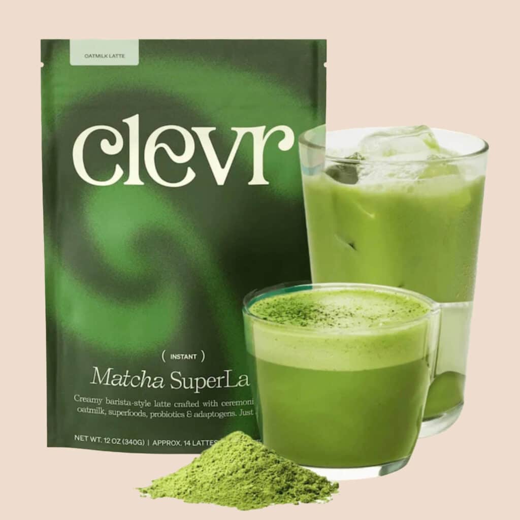 A green Clevr Matcha SuperLatte pouch with two glasses of prepared matcha and a small pile of matcha powder displayed in front.
